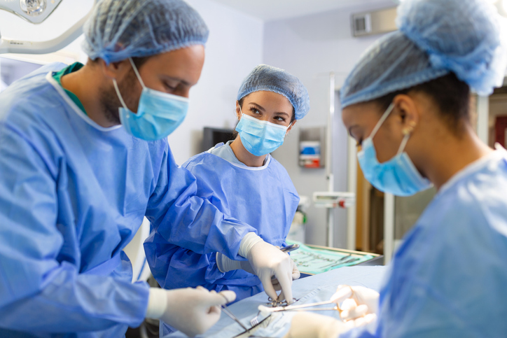 concentrated professional surgical doctor team operating surgery